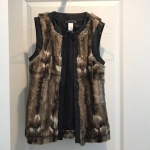 Faux fur and leather vest